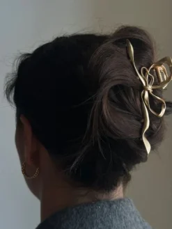 PICO COPENHAGEN Metallic Bow Claw (guld/sølv)